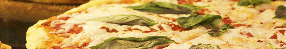 Eating Pizza Vegan Salad at Marigold Kitchen Pizza restaurant in North Bennington, VT.